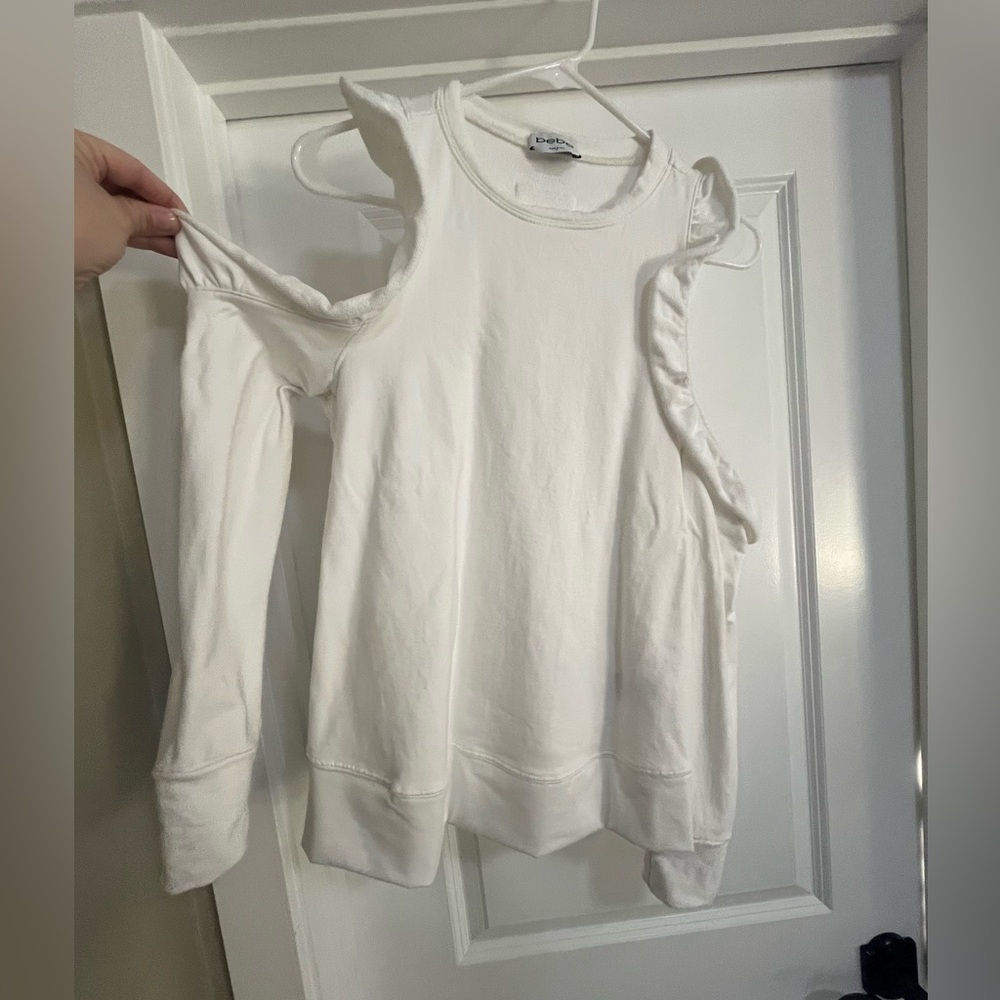 BEBE Ruffled cut out shoulders sweater